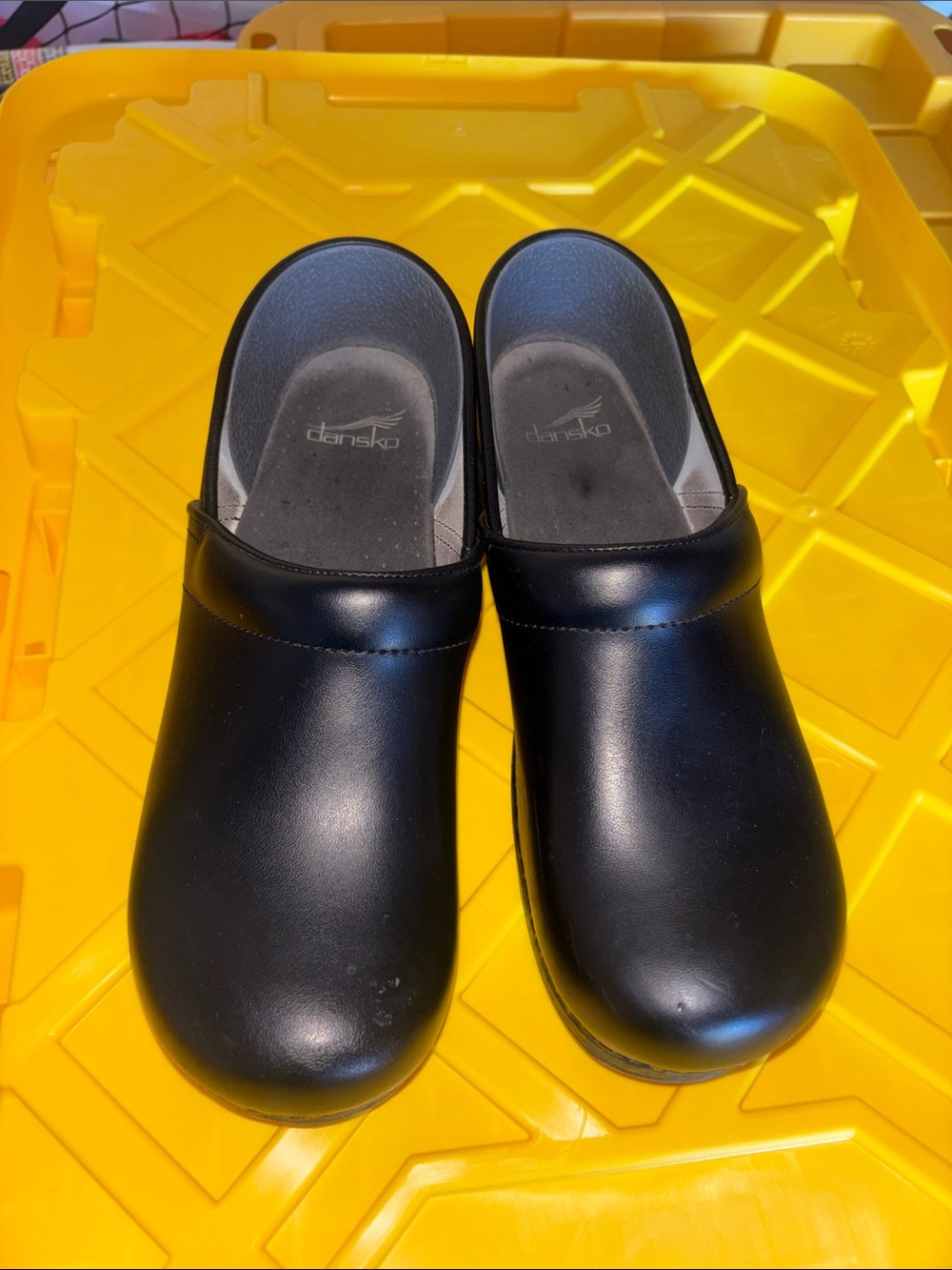 Dansko  Black Slip-On Clogs with Supportive Footbed